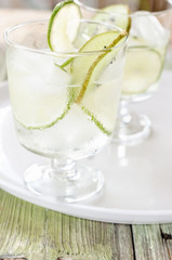 Healthy detox water drink with kiwi and lime