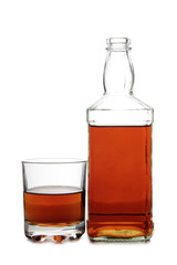 Glass with brandy and whiskey on white background