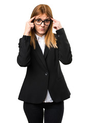 Young business woman thinking