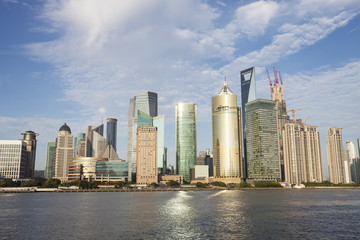 modern buildings near river in modern city