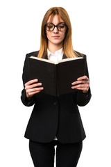 Young business woman reading book