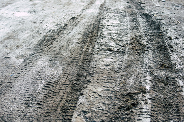Tire tracks on a muddy road