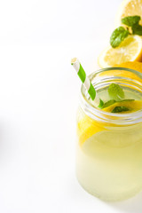 Lemonade drink in a jar glass isolated on white background
