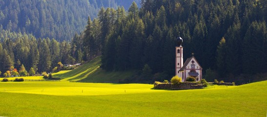 Saint Johann church at the Dolomites alps