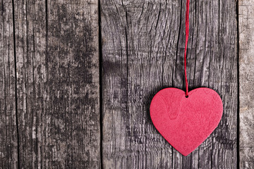 Heart shapes on rustic wooden background