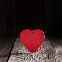 Fototapeta premium Heart shapes on rustic wooden background