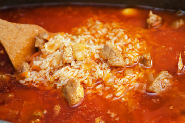 Traditional dish Uzbek pilaf cooking