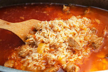 Traditional dish Uzbek pilaf cooking