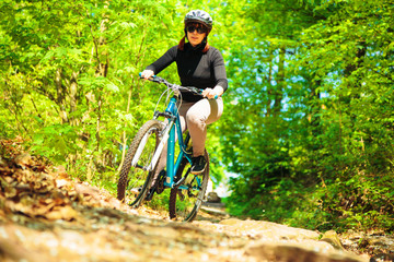 Young Woman Riding Her Mountain Bike