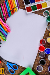 Obraz premium various stationery items on a wooden background with space for text top view 