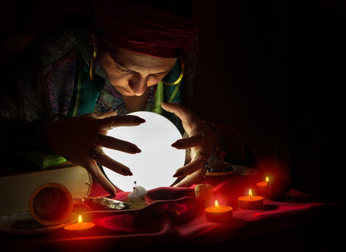 Gypsy Woman Looking At Crystal Ball,reading The Future