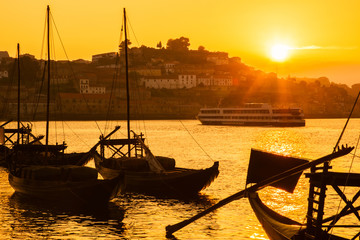 The Douro River in the rays of sunset. Porto. Portugal. Summer season.
