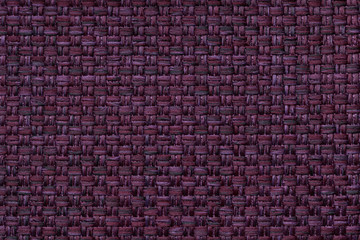 Dark wine textile background with checkered pattern, closeup. Structure of the fabric macro.