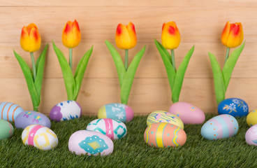 Colorful Easter Eggs With Tulips in Background