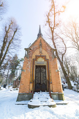 LVIV, UKRAINE - Feb 14, 2017: Ancient crypt in the Lychakivskyj cemetery of Lviv, Ukraine. Officially State History and Culture Museum-Preserve - Lychakiv Cemetery
