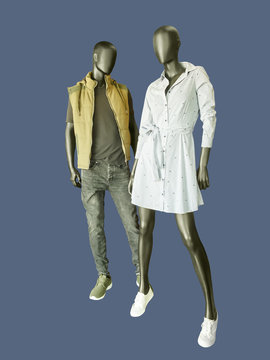 Two mannequins dressed in casual clothes.