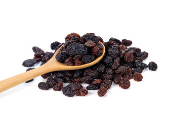 Dried raisins on a white background