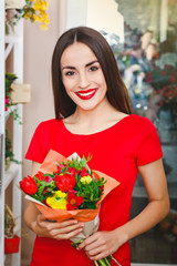 young girl working in a flower shop