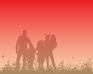 Fototapeta na wymiar silhouette family walking on grass
