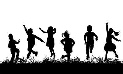 Fototapeta na wymiar silhouette of children jumping on the grass, childhood