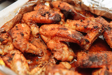 Chicken wings baked in foil in honey sauce