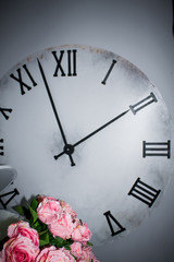 large clock with flowers