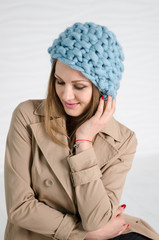 Young sexy woman in blue fashionable merino hat
