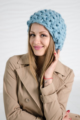 Young sexy woman in blue fashionable merino hat