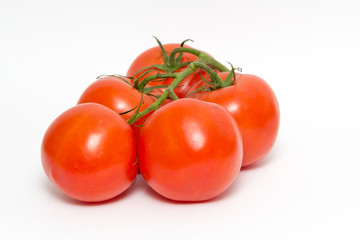 group of fresh red tomatoes isolated on white background