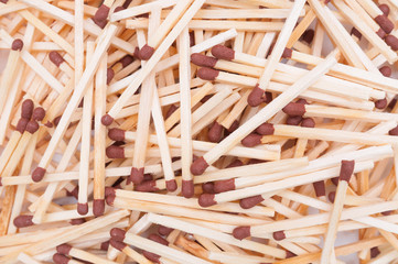 Heap of matches with brown heads closeup