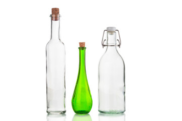 Empty vintage bottles with corks isolated on white background