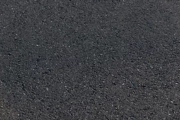Fotobehang Czarna asfaltowa droga tło z masy bitumicznej  © pabisiak