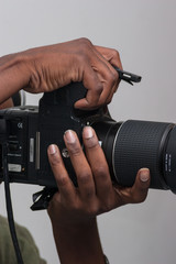 Photographer Holding Large Format Camera