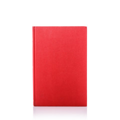 Old book with empty blank cover. Studio shot isolated on white