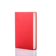Old book with empty blank cover. Studio shot isolated on white
