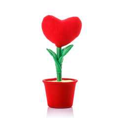 Artificial red heart flower. Studio shot isolated on white