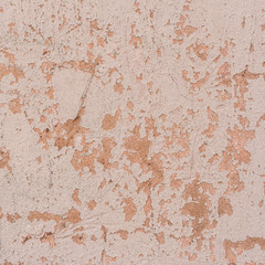 Old wall with cracked and shabby paint