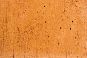 The texture of the rusty metal is orange.