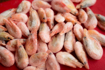 Frozen shrimp close-up on a plate