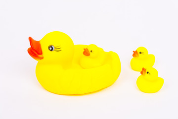 Yellow bath duck toy with little ducks