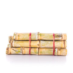Fresh sugar cane. Studio shot isolated on white