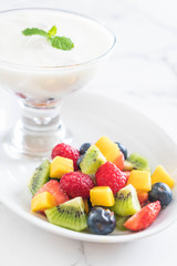 yogurt with mixed fruit (strawberry, blueberries, raspberry, kiwi, mango)