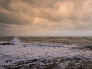 Storm sea and cloudy sky