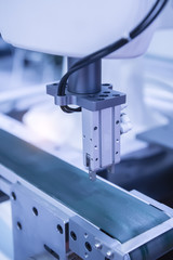 Automatic robot in assembly line working in factory. Smart factory industry 4.0 concept.