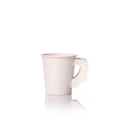 Blank white paper cup for coffee or hot drink. Studio shot isolated on white