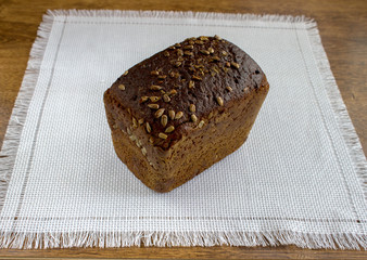 Fototapeta na wymiar Delicious bread on a wooden table