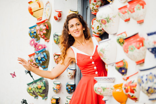 beautiful happy girl in dress in Spain for holidays and modelling