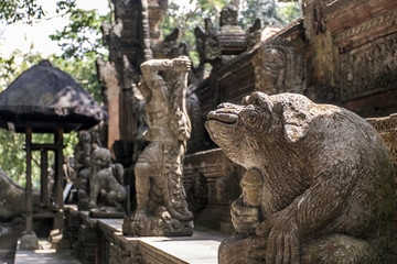 Fototapeta na wymiar Bali Indonesia Ubud Monkey Forest Temple sculpture monkey genitals