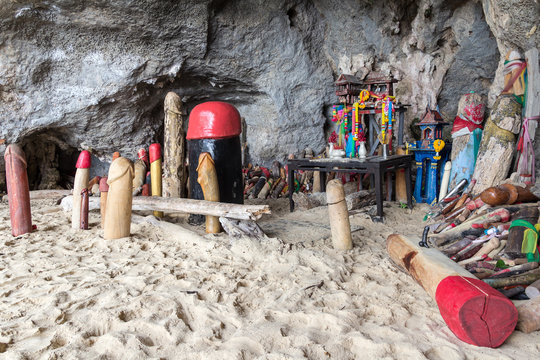 Wooden phalluses in Princess cave (Pranang cave). South Railay beach in Krabi. Thailand.