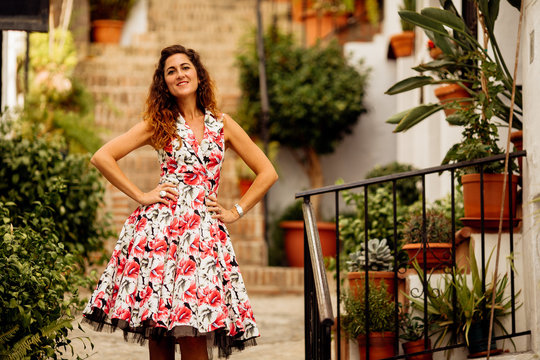 beautiful happy girl in dress in Spain for holidays and modelling